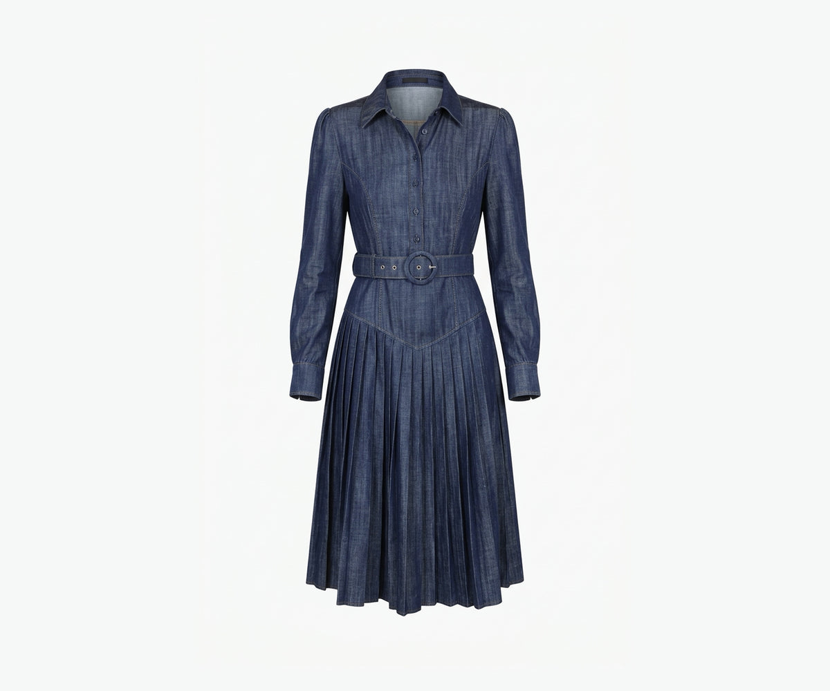 Undra Celeste New York Donna Pleated Dress in Soft Denim, crafted from soft Tencel denim, featuring a tailored button-front bodice, structured shoulders, long sleeves, a flattering V-shaped waist yoke, matching belt, and a flowing pleated midi skirt. Sophisticated contemporary women's workwear.