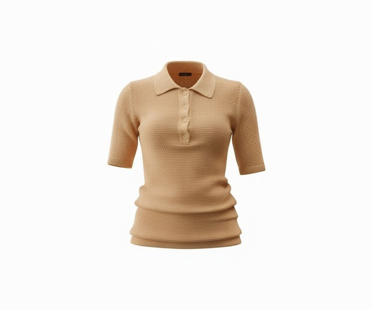 Undra Celeste New York Beach Knit Polo Shirt in Beige, featuring a textured lightweight knit, classic polo collar, four-button placket, short fitted sleeves, and a relaxed silhouette. A sophisticated knit polo shirt for elevated contemporary women's fashion and effortless smart-casual dressing.